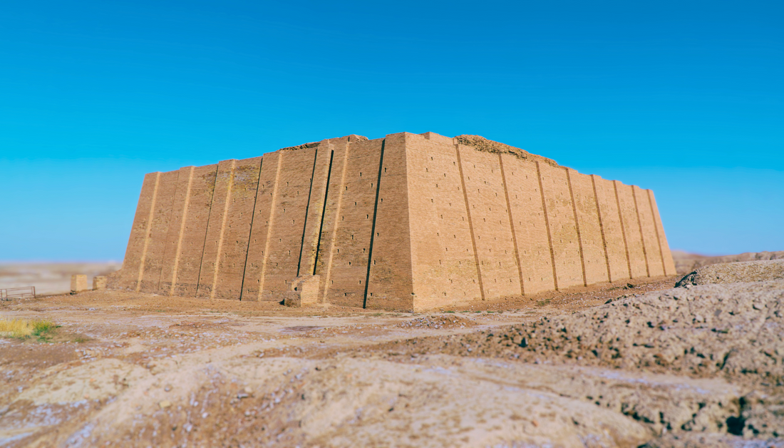 Ziggurat of Ur in a desert landscape at sunset, with ancient Mesopotamian details.