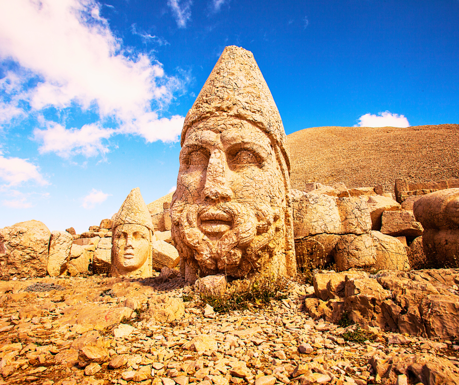 Stone heads of ancient gods at Mount Nemrut in Turkey, part of a 1st-century royal tomb and temple complex.